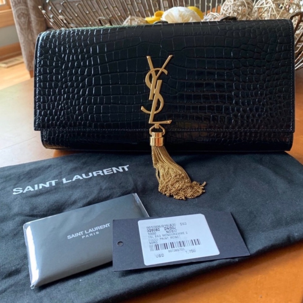 YSL “KATE MONOGRAM CROCODILE EMBOSSED TASSEL CLUTCH”